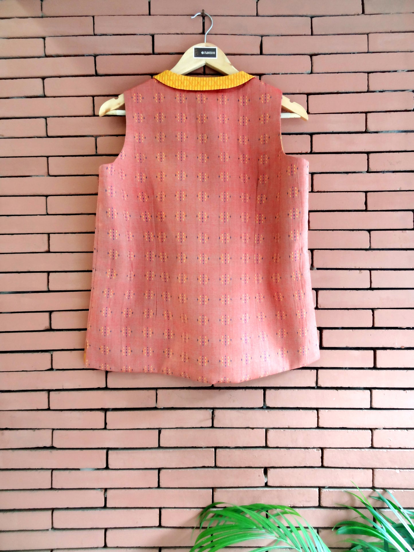 Nakshi Peach & Yellow Cotton Lining Women's Sleeveless jacket With Front Pocket Details