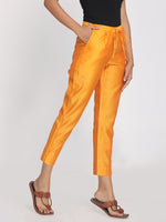 Load image into Gallery viewer, Pure chanderi orange solid cropped pant
