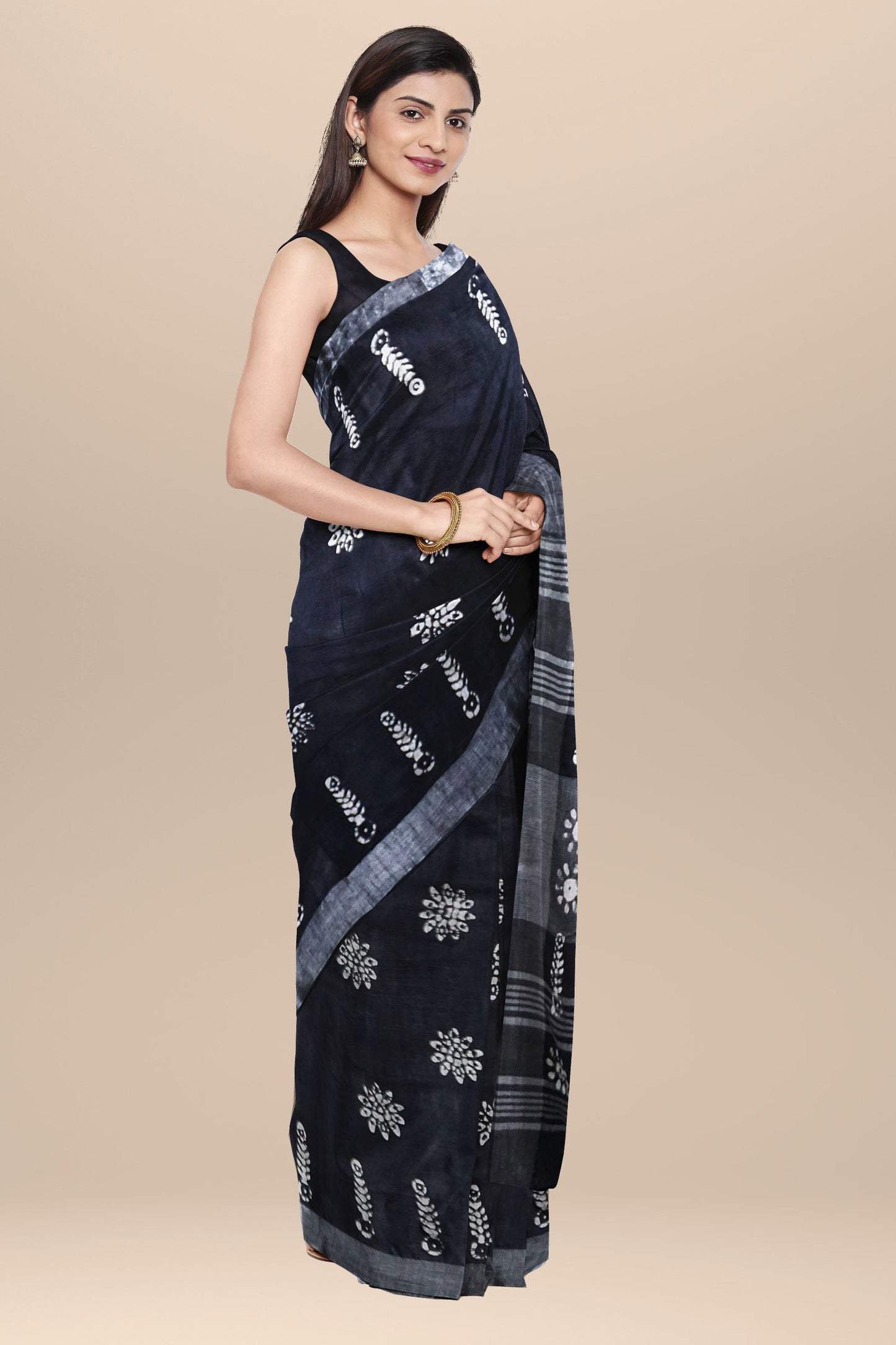 Nakshi Black Cotton Batik Printed Saree