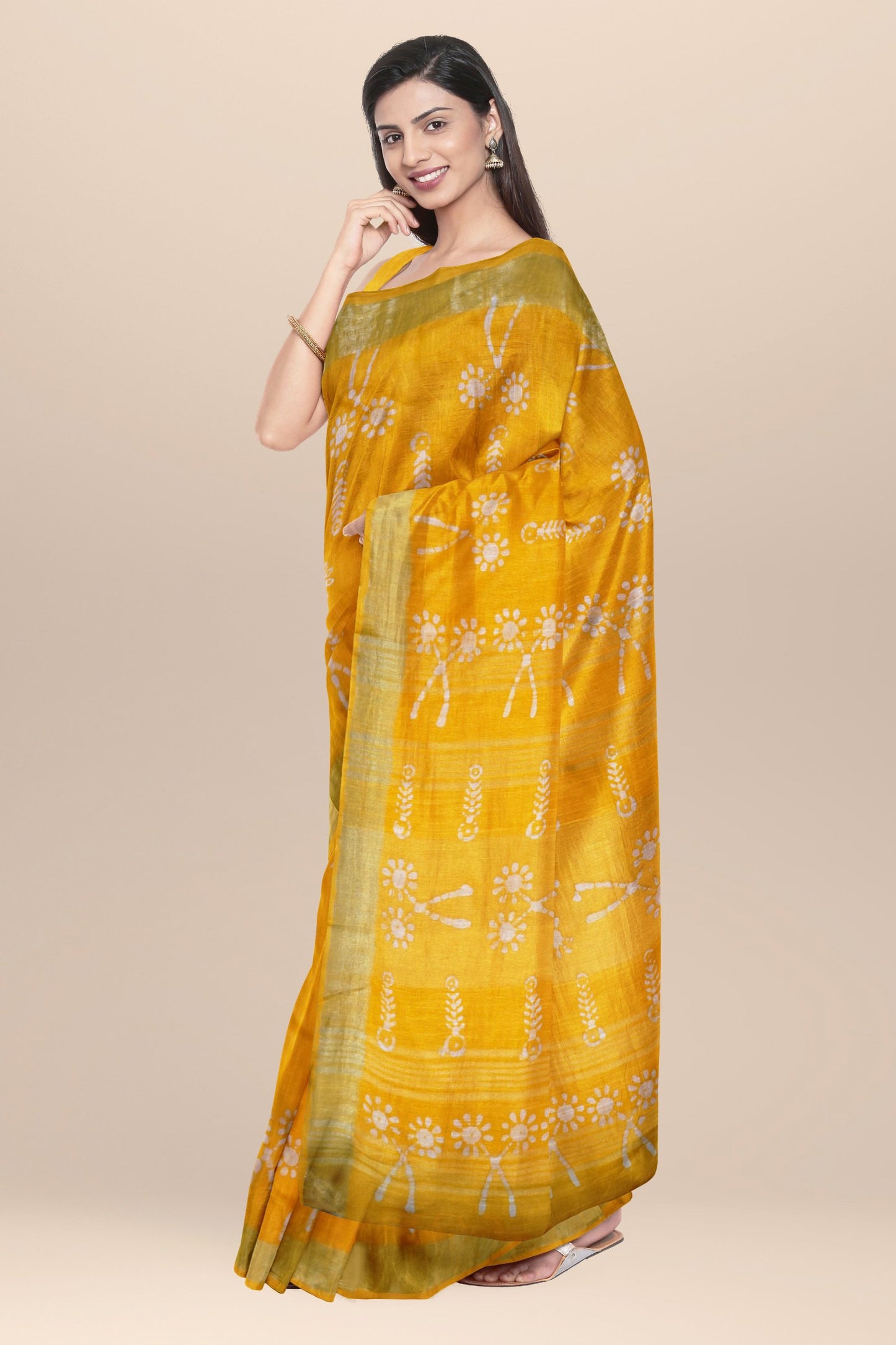 Nakshi Yellow Cotton Batik Printed Saree