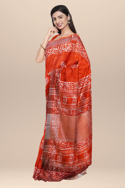 Nakshi Orange Cotton Batik Printed Saree