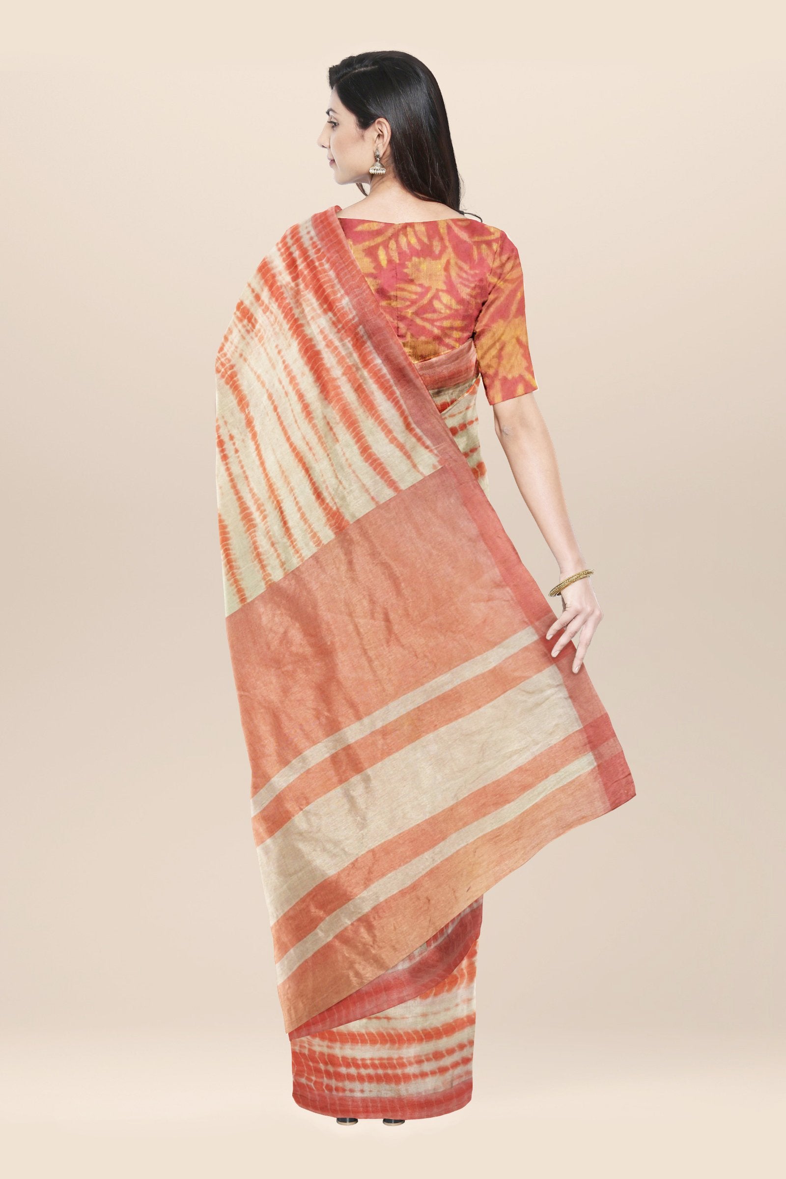 Beige handwoven tie dyed cotton saree