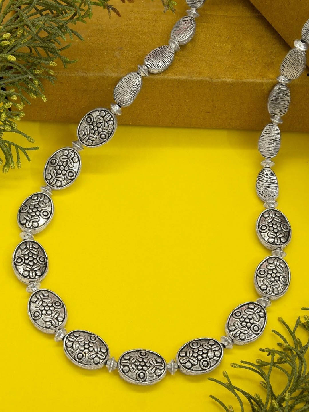 Nakshi Handcrafted German Silver Oval Shape Necklace Set