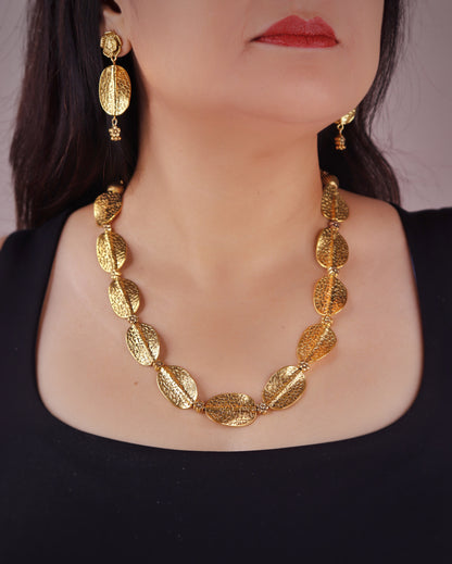 Nakshi Handcrafted Gold Metal Oval Shape Necklace Set